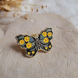Pin's papillon fleuri