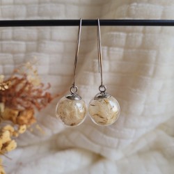 Boucles d'oreilles sphère en verre et fleurs séchées de Pissenlit.