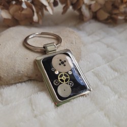 Porte-clé de style Steampunk avec pièces détachées de montre.