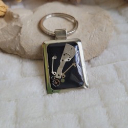 Porte-clé de style Steampunk avec pièces détachées de montre.
