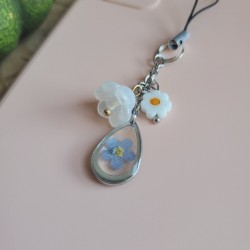 Bijoux de téléphone pendentif goutte avec fleur séchée de Myosotis.