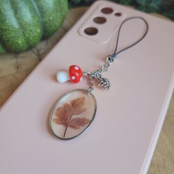 Bijoux de téléphone pendentif ovale avec feuille séchée de Géranium.