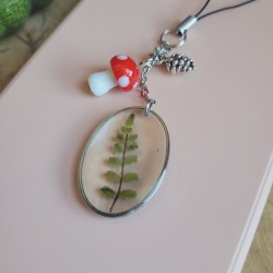 Bijoux de téléphone pendentif ovale avec feuille séchée d'Asplénium.