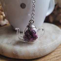 Boule à thé pendentif théière verre et fleur de Lilas.