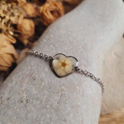 Bracelet en acier inoxydable et pendentif coeur avec fleur séchée de Spirée.