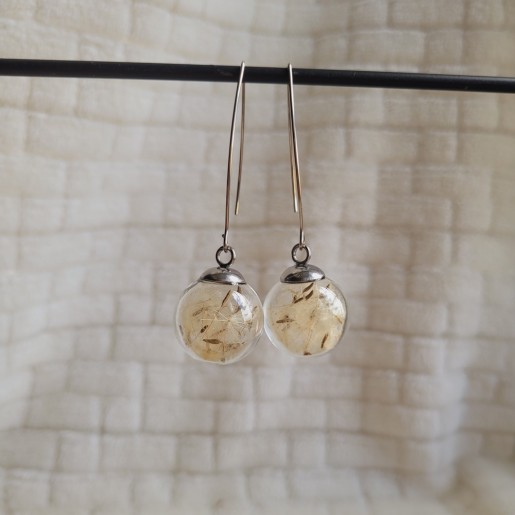 Boucles d'oreilles sphère en verre et fleurs séchées de Pissenlit.